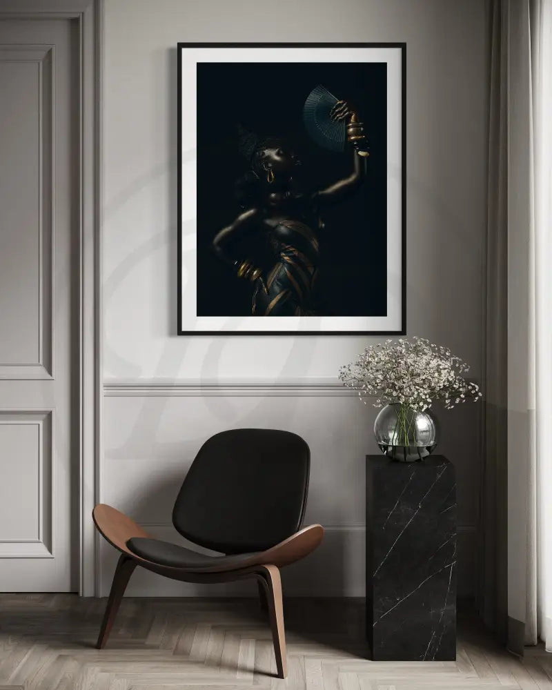 Printable wall art of a stylish woman with fan and braids, highlighted with gold jewelry against a moody backdrop.