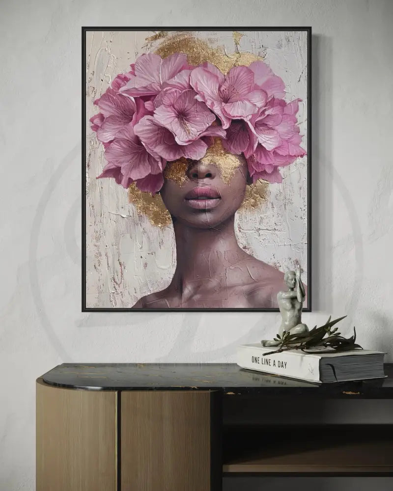 Afrocentric cultural art print with pink flowers and gold tones.