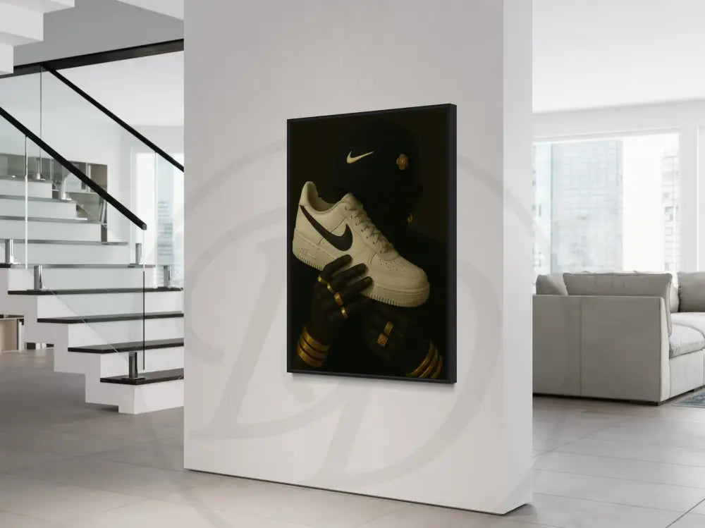 Afrocentric wall art with sneakers, gold rings, and bangles.