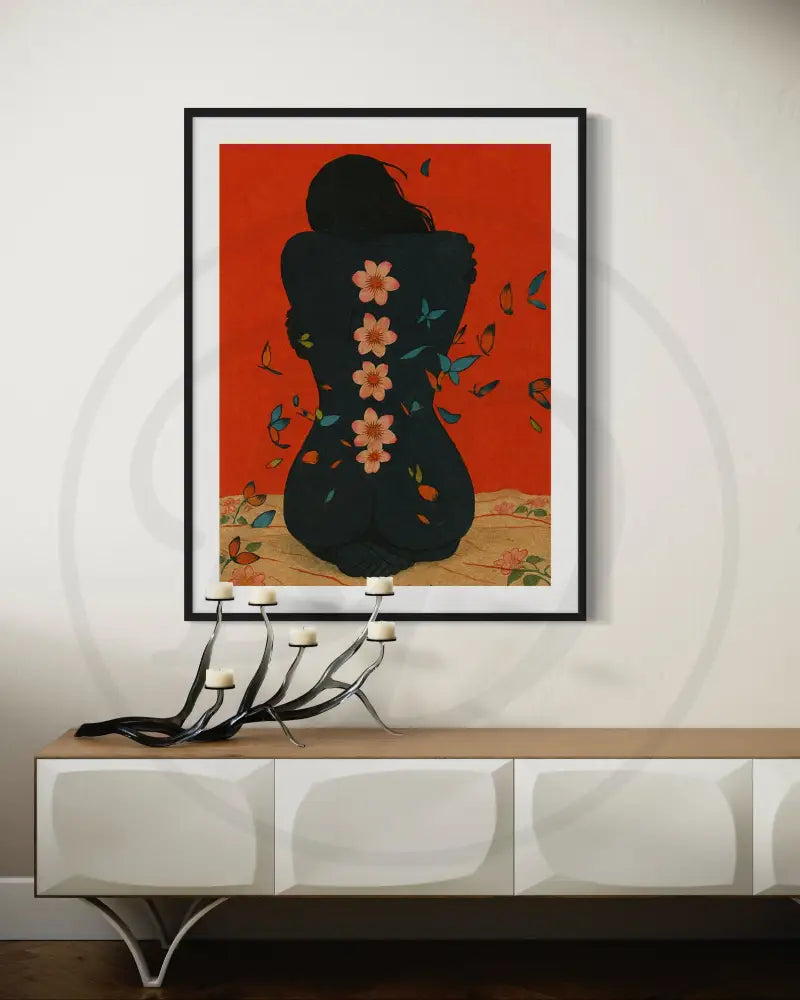 Afrocentric nude wall art with red background and petals