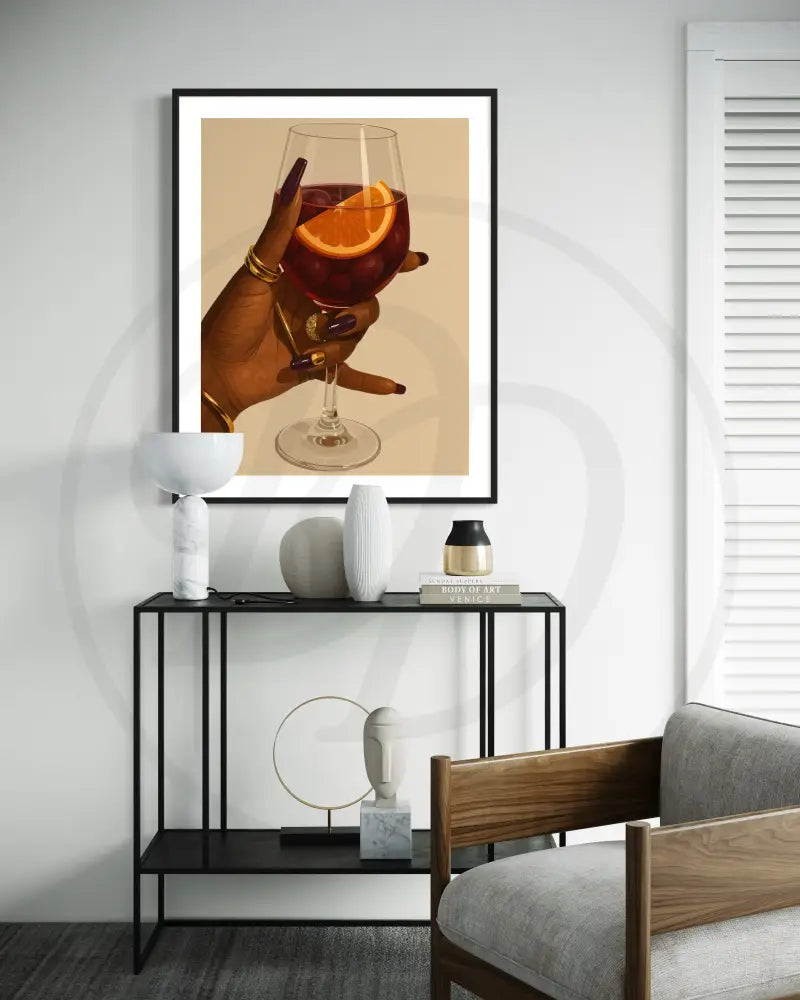 Printable art of a Black woman’s hand holding wine glass with orange slice
