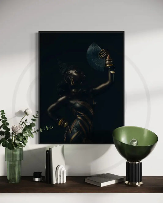 Afrocentric digital wall art of a Black woman with sculpted braids and gold jewelry holding a folded fan against a dark background.