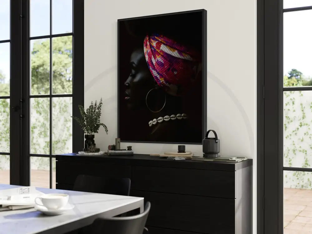 Afrocentric minimalist wall art celebrating Black woman beauty with a patterned headwrap and hoop earrings.