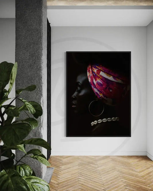 Afrocentric digital wall art of a Black woman in profile wearing a vibrant headwrap, hoop earrings, and cowrie shell necklace.