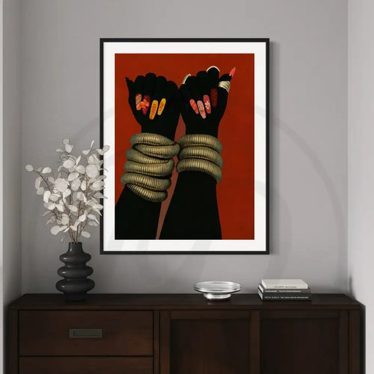 Afrocentric digital wall art of Black hands with gold bangles and floral nails.