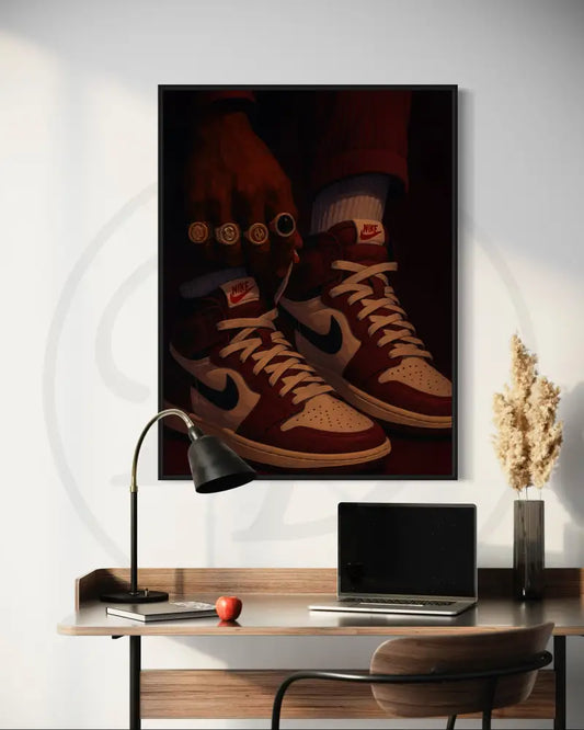 Afrocentric sneaker wall art of Black man tying sneakers