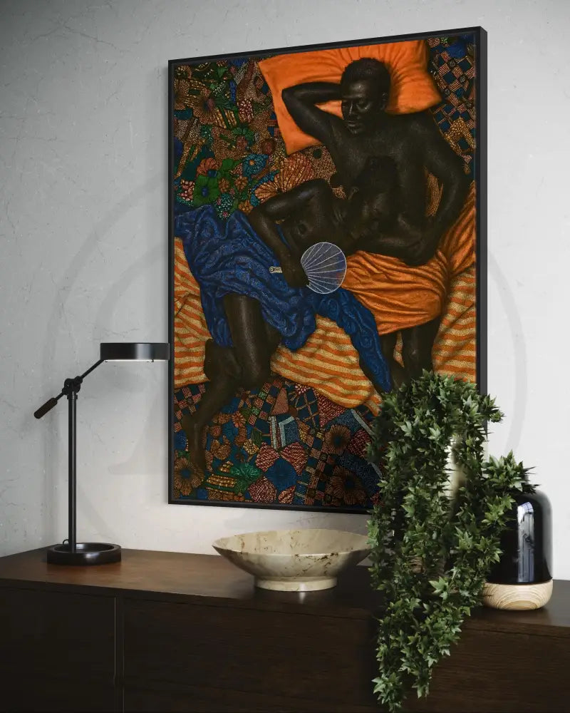Couple resting with vibrant Afrocentric fabrics